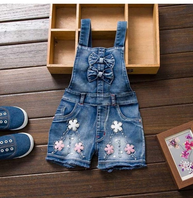 FRÜHLINGS-Sommer-US-Art-Mädchen-Overall-nette süße Mode gewaschene Jeans-Denim-Spielanzug-Overall-Träger-kurze Hosen-Cowboy-Blau
