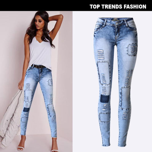 Beliebte Slim Pencil Pants Stretch Denim Ripped Pencil Pants sind dünne Trendmodelle mit Multi-Loch-Patch 